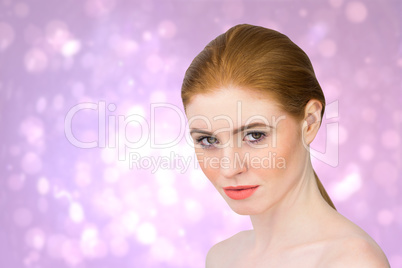 Composite image of beautiful redhead looking at camera