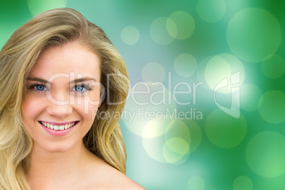 Composite image of smiling blonde natural beauty