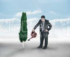 Composite image of mature businessman using watering can