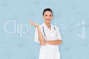 Composite image of pretty nurse presenting