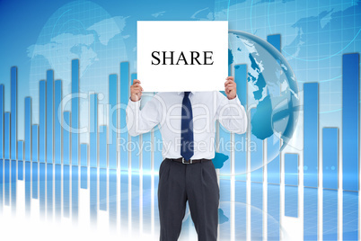 Businessman holding card saying share