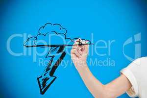 Composite image of businesswoman drawing cloud with lightning