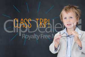Class trip against schoolboy and blackboard