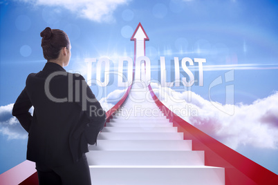 To do list against red steps arrow pointing up against sky