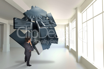 Composite image of thinking businessman touching his chin