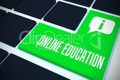 Online education against green key on black keyboard