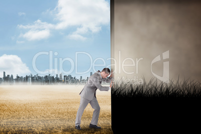 Composite image of businessman pushing away scene