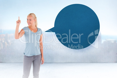 Composite image of charming woman pointing with speech bubble