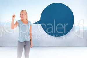 Composite image of charming woman pointing with speech bubble