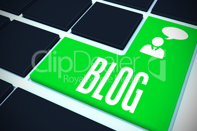 Blog on black keyboard with green key