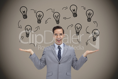 Composite image of smiling businessman presenting graphics with