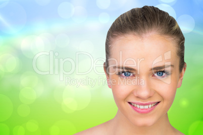 Composite image of smiling blonde natural beauty