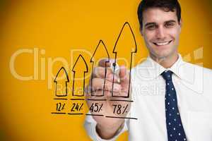 Composite image of businessman drawing graph