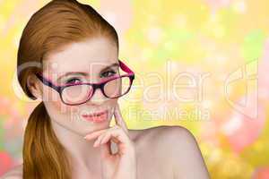Composite image of beautiful redhead posing with glasses