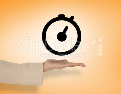 Composite image of female hand presenting clock Composite image of female hand presenting clock