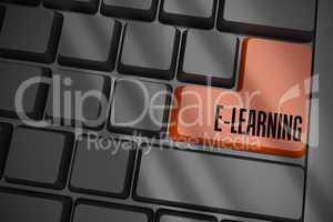 E-learning on black keyboard with brown key