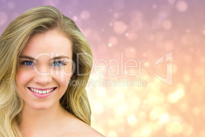 Composite image of smiling blonde natural beauty