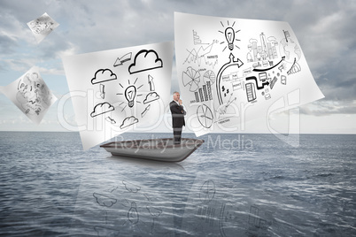 Composite image of happy businessman looking away in a sailboat