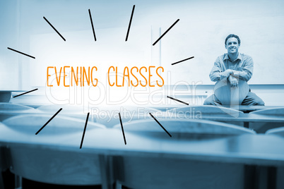Evening classes against lecturer sitting in lecture hall