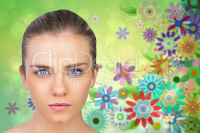 Composite image of serious blonde natural beauty