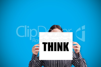 Businesswoman holding card saying think