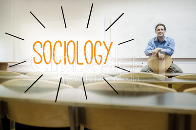 Sociology against lecturer sitting in lecture hall