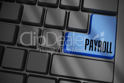 Payroll on black keyboard with blue key