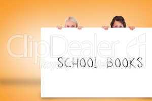 Attractive couple showing card with school books