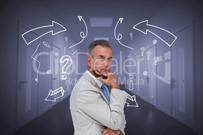 Composite image of thinking businessman