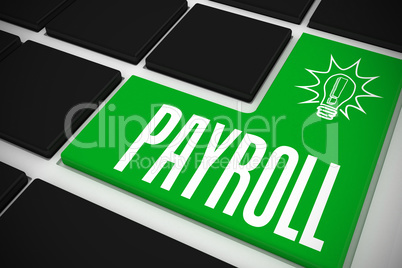 Payroll on black keyboard with green key