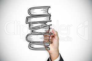 Composite image of businessman drawing books