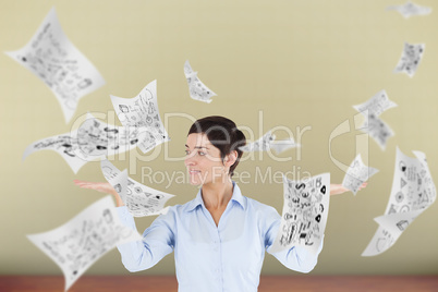 Composite image of businesswoman with an open hand to show flyin