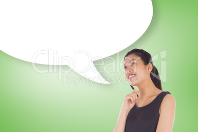 Composite image of thinking businesswoman with speech bubble