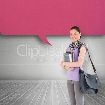 Composite image of attractive student holding books and her bag