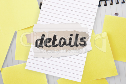 Details against sticky notes strewn over notepad