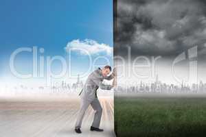 Composite image of businessman pushing away scene