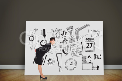 Composite image of serious businesswoman bending Composite image of serious businesswoman bending