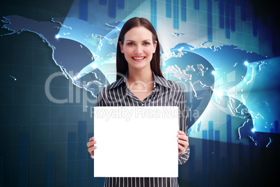 Composite image of businesswoman showing card