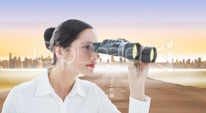 Composite image of business woman looking through binoculars