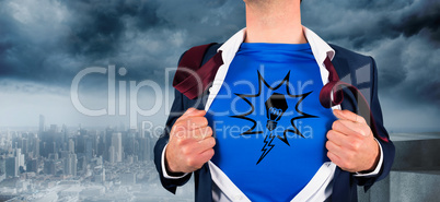 Composite image of businessman opening his shirt superhero style