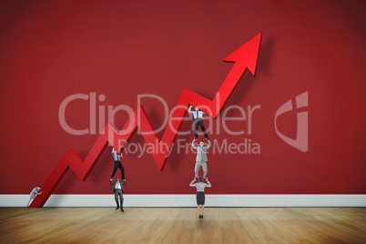 Composite image of business team holding up arrow Composite image of business team holding up arrow
