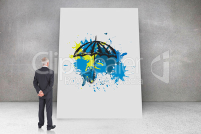 Composite image of rear view of mature businessman posing