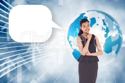 Composite image of thoughtful asian businesswoman with speech bu