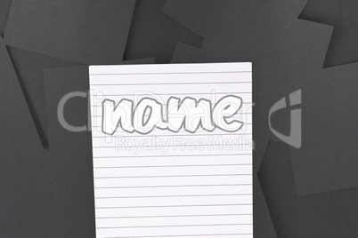 Name against digitally generated grey paper strewn