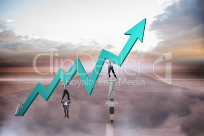 Composite image of business team holding up arrow Composite image of business team holding up arrow