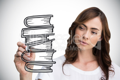 Composite image of businesswoman drawing books