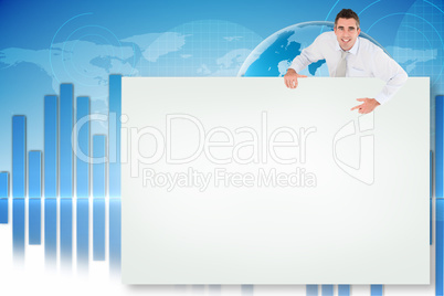 Composite image of businessman showing card Composite image of businessman showing card
