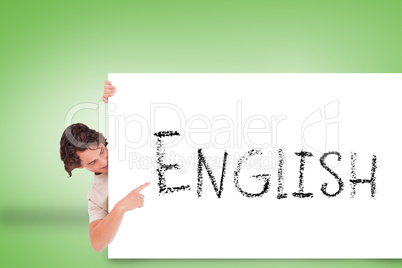 Handsome young man showing card with english