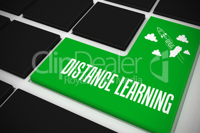 Distance learning on black keyboard with green key