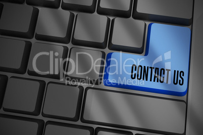 Contact us on black keyboard with blue key Contact us on black keyboard with blue key